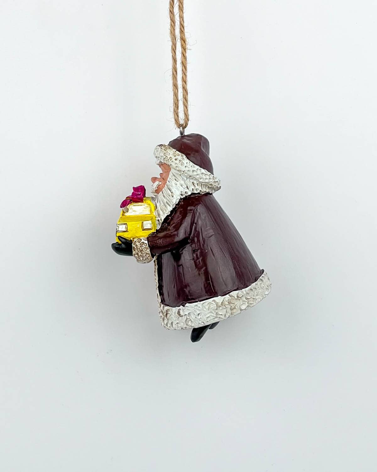 Santa Holding a Yellow Cap NYC Taxi Christmas Ornament - Image 4