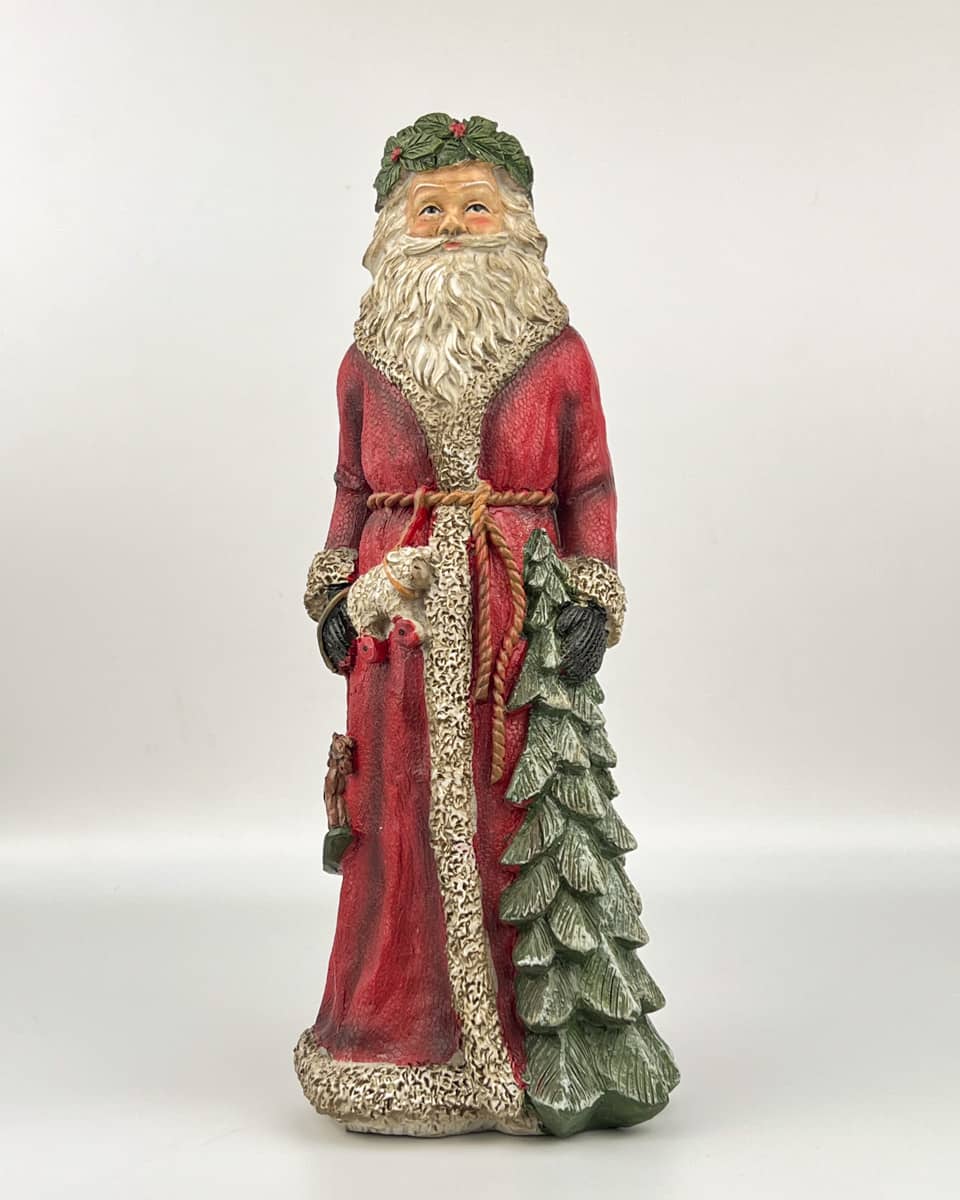 Vintage Santa Holding Christmas Tree Decorations.